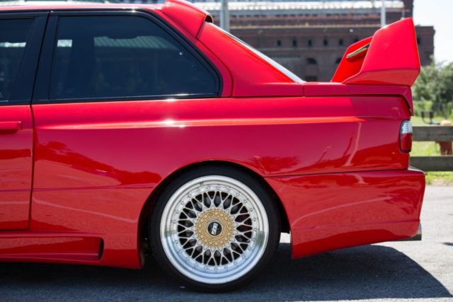 1988 red BMW M3 Coupe