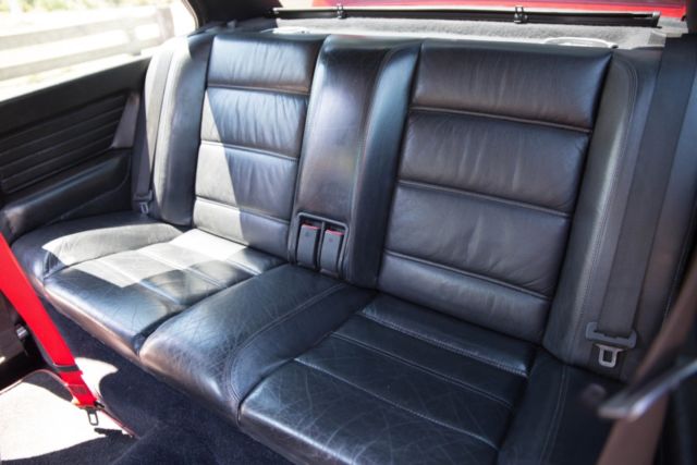 1988 red BMW M3 Coupe