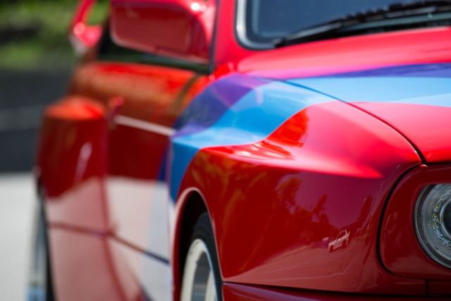1988 red BMW M3 Coupe