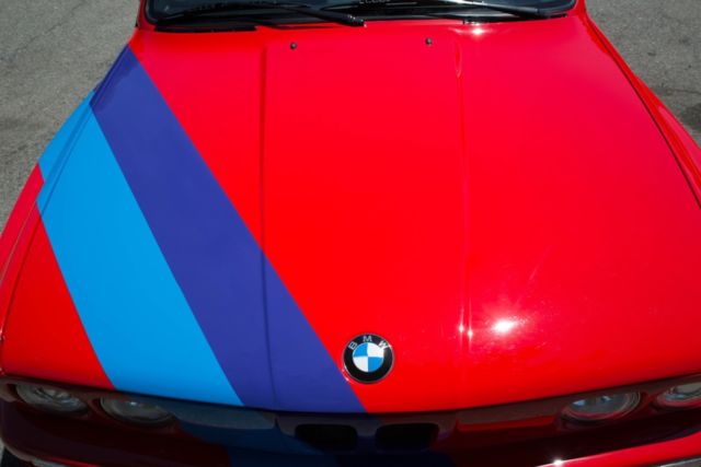1988 red BMW M3 Coupe