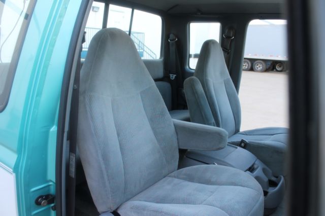 1994 two tone Ford F-250 Standard Cab Pickup