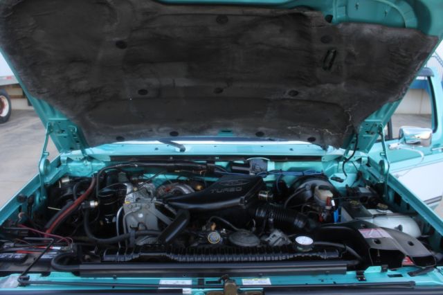 1994 two tone Ford F-250 Standard Cab Pickup