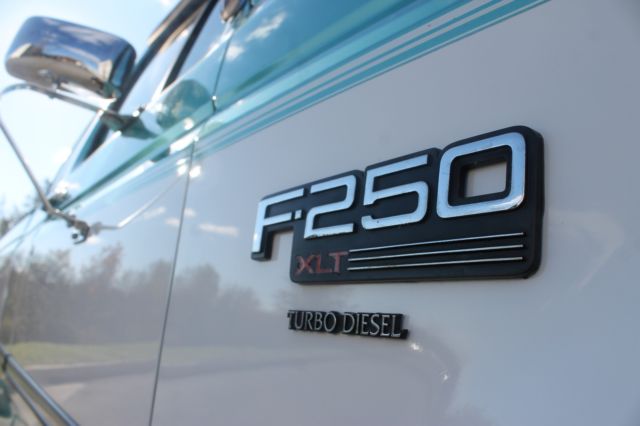 1994 two tone Ford F-250 Standard Cab Pickup