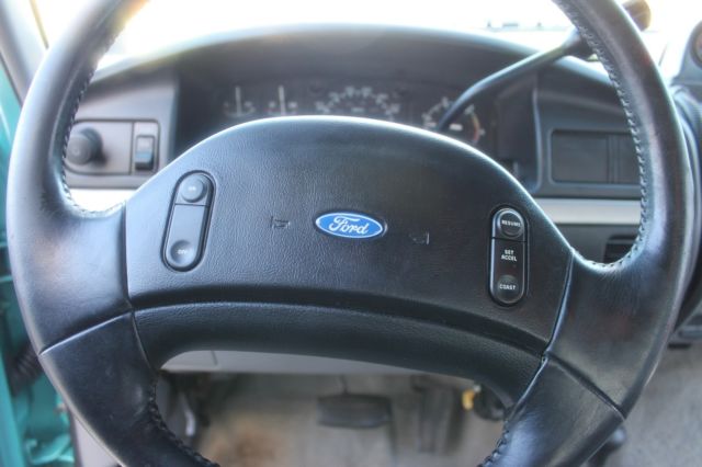 1994 two tone Ford F-250 Standard Cab Pickup