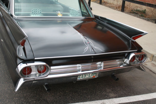 1961 Flat Black Cadillac DeVille Sedan