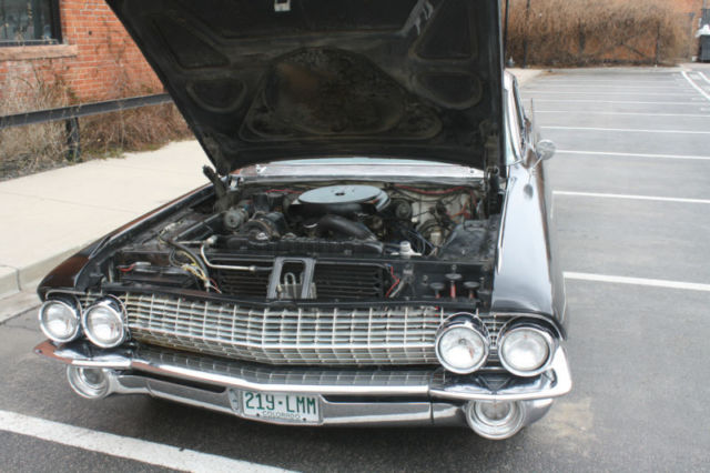 1961 Flat Black Cadillac DeVille Sedan