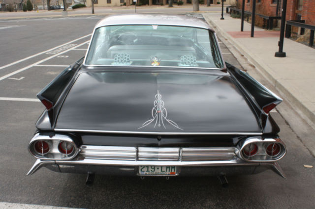 1961 Flat Black Cadillac DeVille Sedan