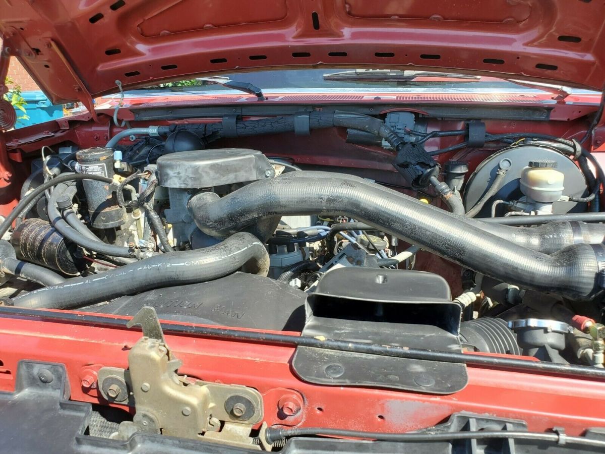 1991 Red Ford F-150 Standard Cab Pickup