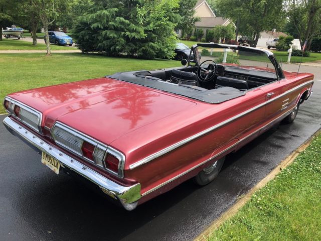 1966 Burgundy Plymouth Fury Convertible