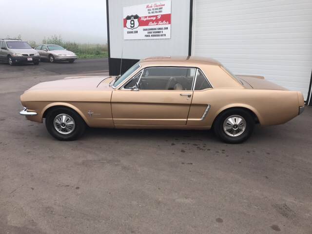 1965 Gold Ford Mustang
