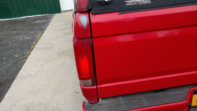 1993 Red Ford F-150 Standard Cab Pickup