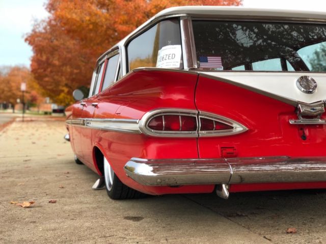 1959 Red Chevrolet Impala Wagon