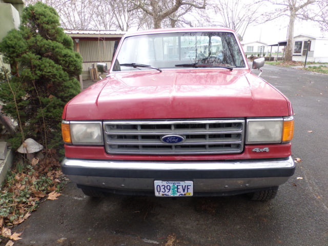1988 red Ford F-150 Standard Cab Pickup