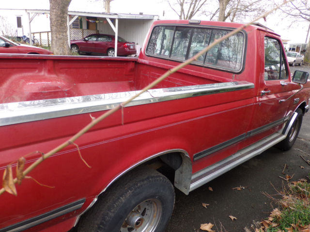 1988 red Ford F-150 Standard Cab Pickup