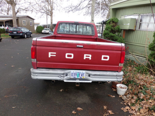 1988 red Ford F-150 Standard Cab Pickup