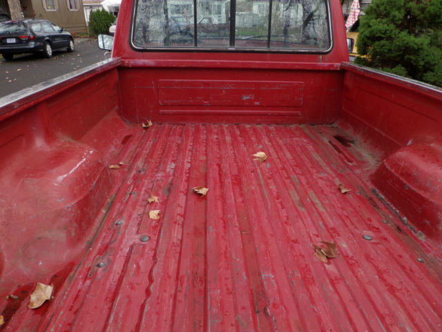 1988 red Ford F-150 Standard Cab Pickup