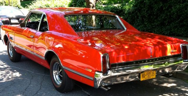 1966 Red Oldsmobile 442 Cutlass Coupe w/post