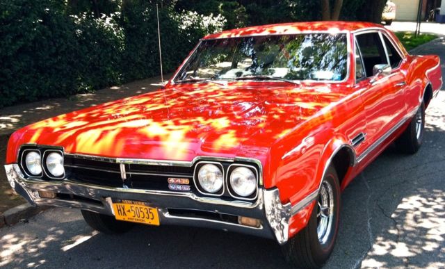 1966 Red Oldsmobile 442 Cutlass Coupe w/post