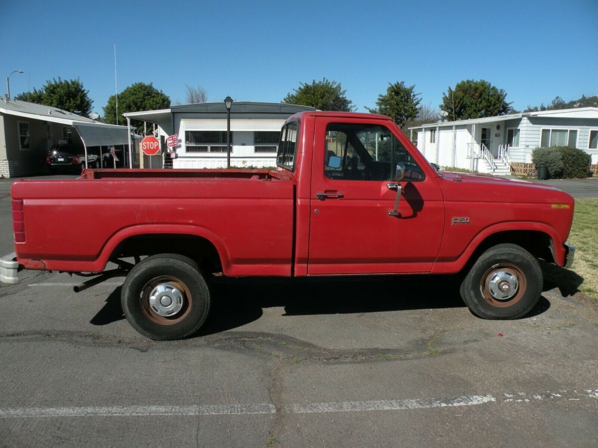 1986 Red Ford F-150 Standard Cab Pickup