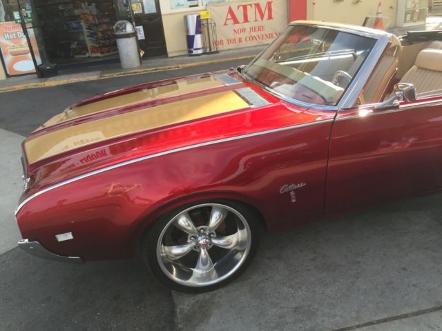 1969 Orange Oldsmobile Cutlass Convertible