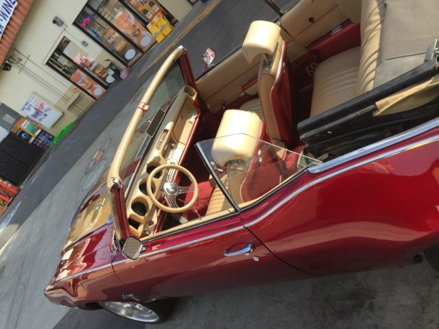 1969 Orange Oldsmobile Cutlass Convertible