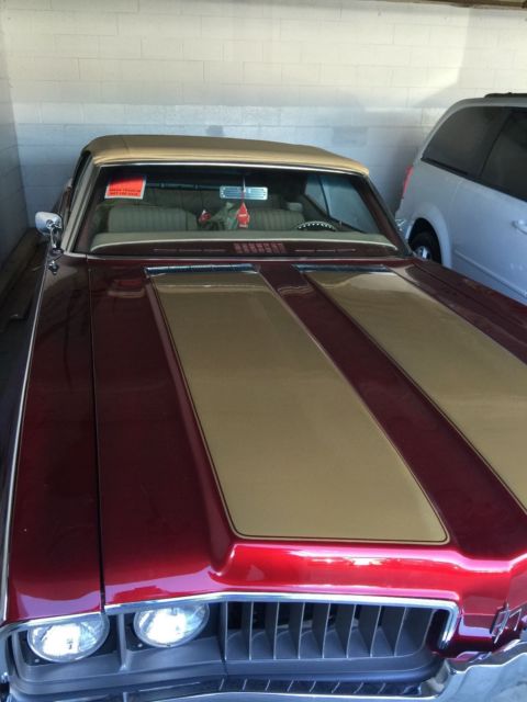 1969 Orange Oldsmobile Cutlass Convertible