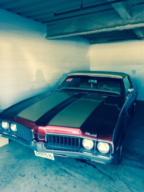 1969 Orange Oldsmobile Cutlass Convertible