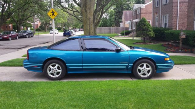 1994 Teal Oldsmobile Cutlass Coupe