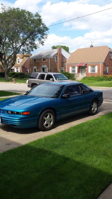 1994 Teal Oldsmobile Cutlass Coupe