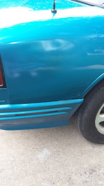1994 Teal Oldsmobile Cutlass Coupe