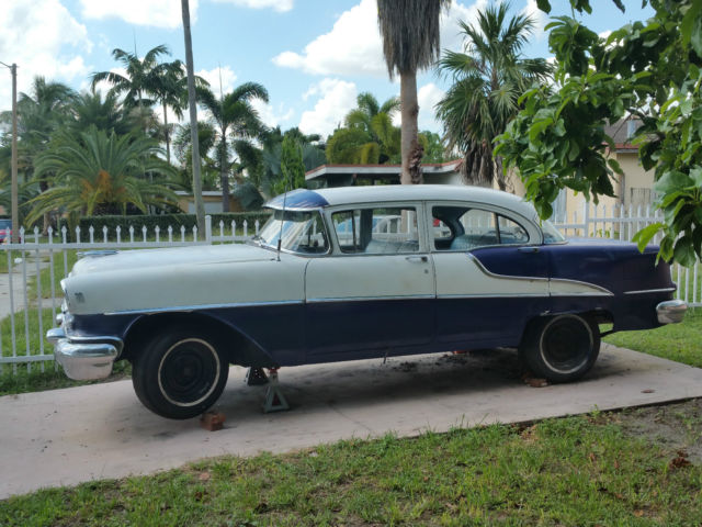 1955 Blue and White Oldsmobile Eighty-Eight Coupe