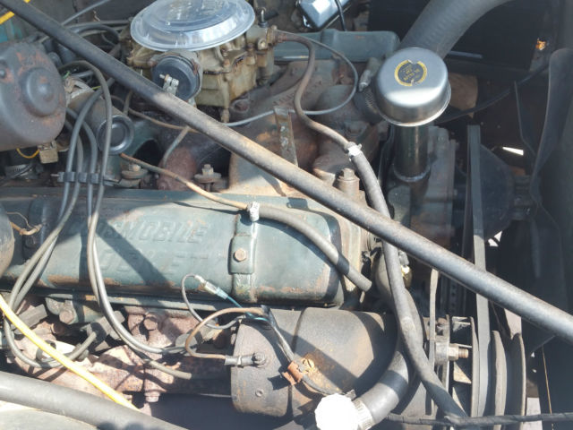 1955 Blue and White Oldsmobile Eighty-Eight Coupe