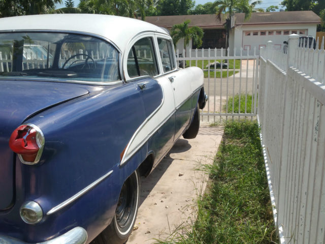 1955 Blue and White Oldsmobile Eighty-Eight Coupe