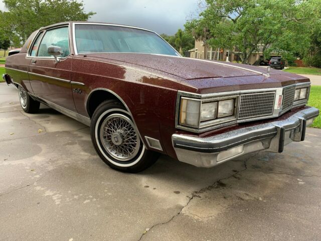 1984 Burgundy Oldsmobile Ninety-Eight Coupe