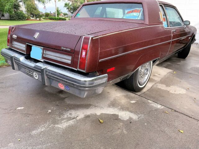 1984 Burgundy Oldsmobile Ninety-Eight Coupe