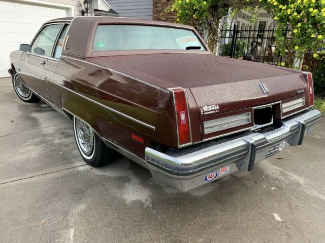 1984 Burgundy Oldsmobile Ninety-Eight Coupe
