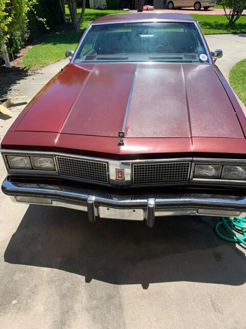 1984 Burgundy Oldsmobile Ninety-Eight Coupe