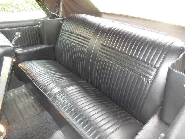 1964 Yellow Oldsmobile Cutlass Convertible