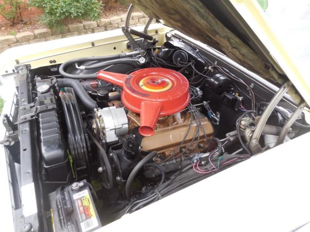 1964 Yellow Oldsmobile Cutlass Convertible