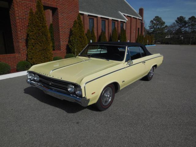 1964 Yellow Oldsmobile Cutlass Convertible
