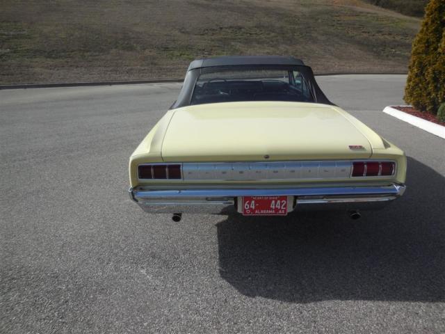 1964 Yellow Oldsmobile Cutlass Convertible