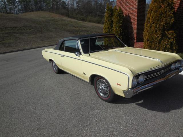 1964 Yellow Oldsmobile Cutlass Convertible