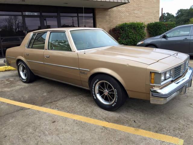 1986 Gold Oldsmobile Cutlass Sedan