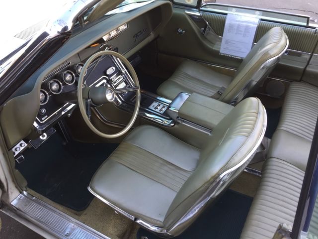 1965 White Ford Thunderbird Convertible
