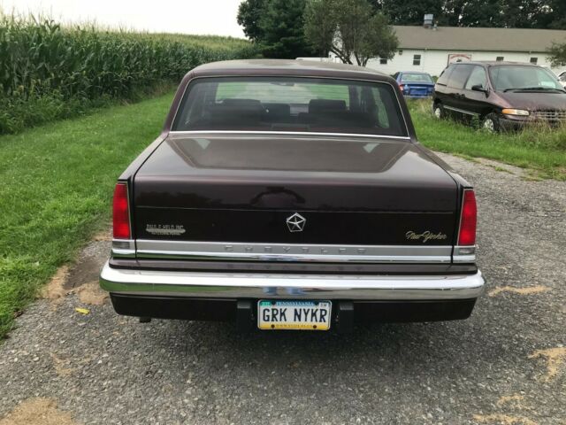 1988 Burgundy Chrysler New Yorker Sedan