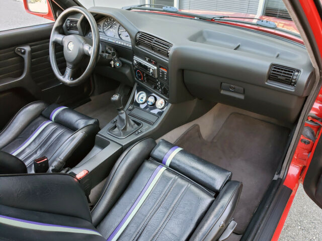 1991 red BMW 3-Series two door sedan