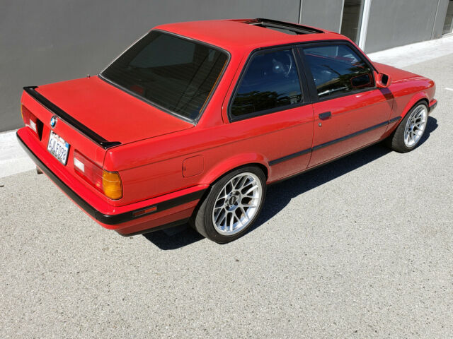 1991 red BMW 3-Series two door sedan