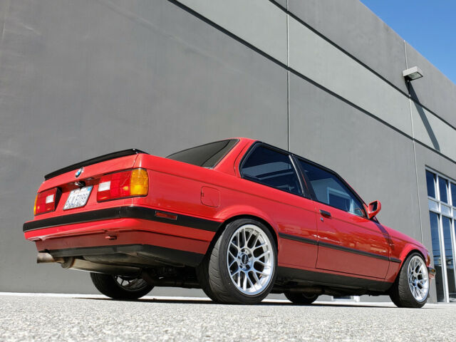 1991 red BMW 3-Series two door sedan