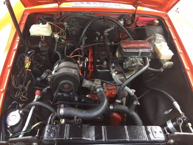 1977 vermillion MG MGB Convertible