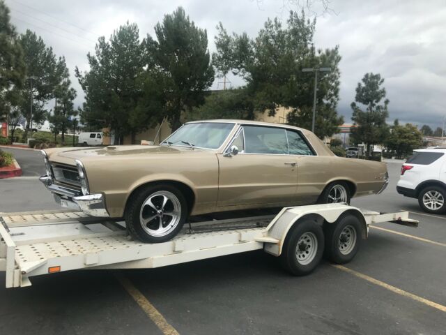 1965 Gold Pontiac GTO Coupe